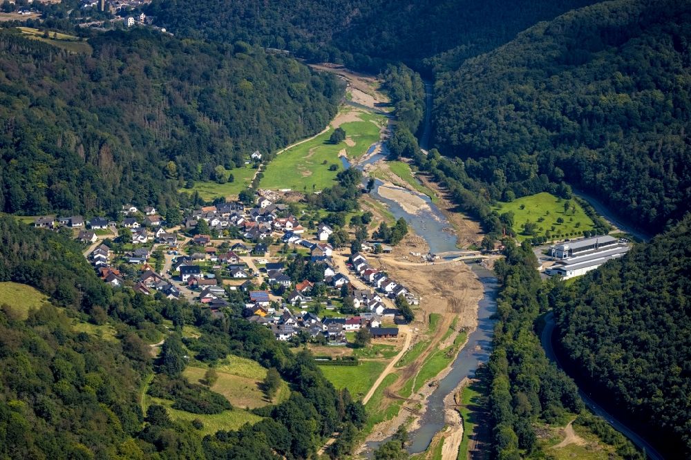 Aerial image Hönningen - Flood damage and reconstruction construction sites in the floodplain on riverside of Ahr in Hoenningen in the state Rhineland-Palatinate, Germany