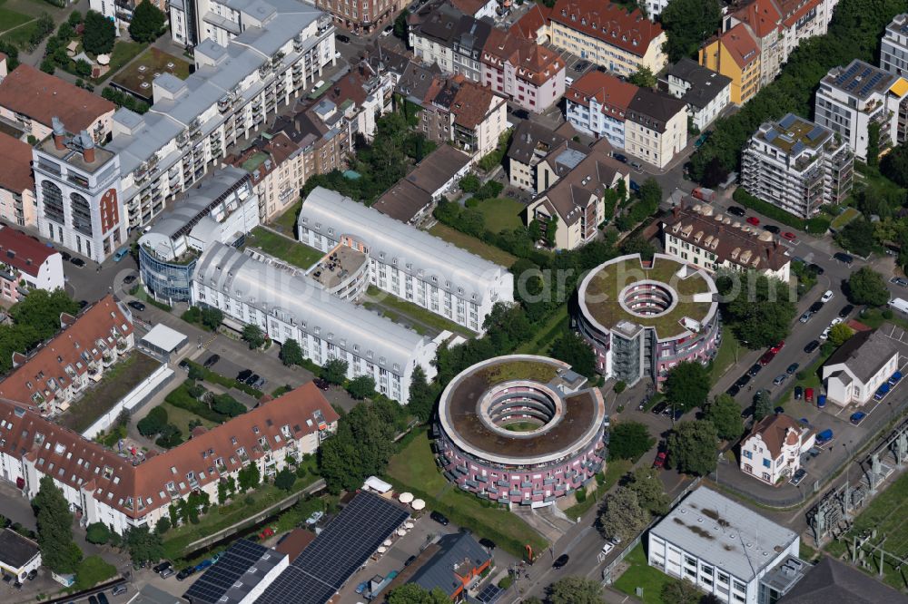 Aerial image Freiburg im Breisgau - Building complex of the StayInn Freiburg holiday apartments, hostel and guest house and the round houses of the Urania Freiburg in Freiburg im Breisgau in the state Baden-Wuerttemberg, Germany