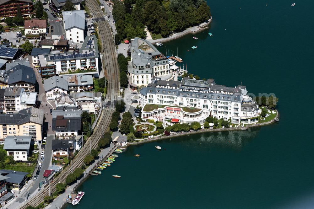 Zell am See from above - Complex of the hotel building GRAND HOTEL ZELL AM SEE on street Esplanade in Zell am See in the Alps in Salzburg, Austria