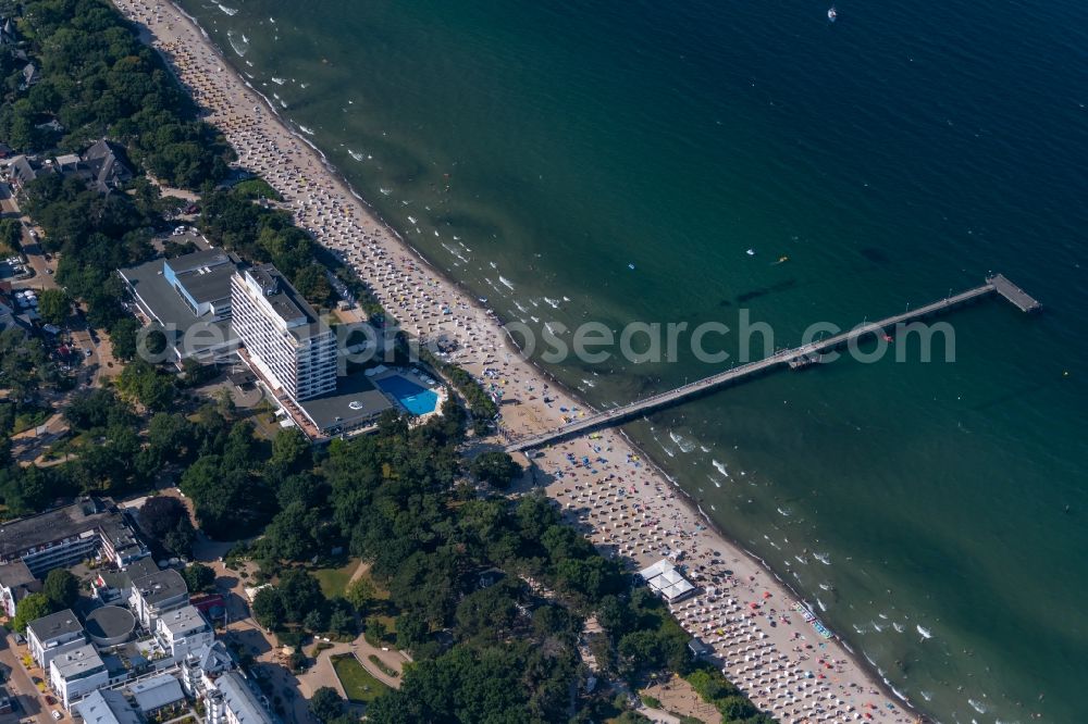 Timmendorfer Strand from the bird's eye view: High-rise building of the hotel complex Maritim Seehotel Timmendorfer Strand with a view of the beach and pier in Timmendorfer Strand in the state Schleswig-Holstein, Germany