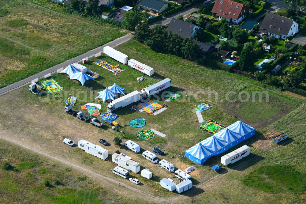 Berlin from above - Bouncy castles - construction of the play paradise as a replacement business for the circus AEROS on Parlerstrasse in the district of Mahlsdorf in Berlin, Germany