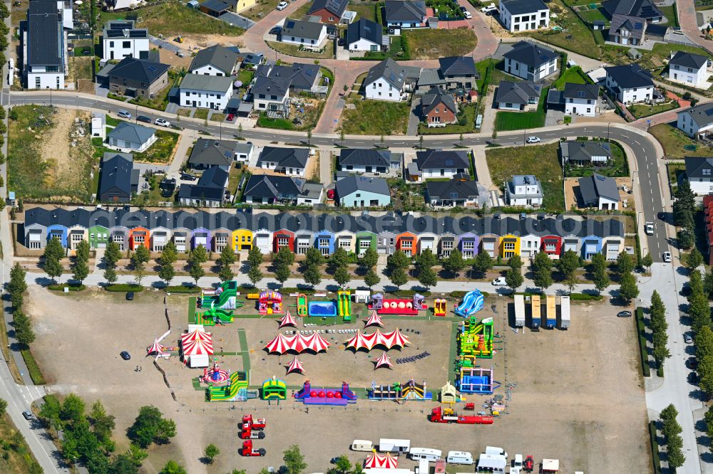 Hansestadt Wismar from above - Bouncy castles on the square ensemble Festplatz Buergerpark on the street Zum Festplatz in the Hanseatic city of Wismar on the Baltic Sea coast in the state Mecklenburg - Western Pomerania, Germany