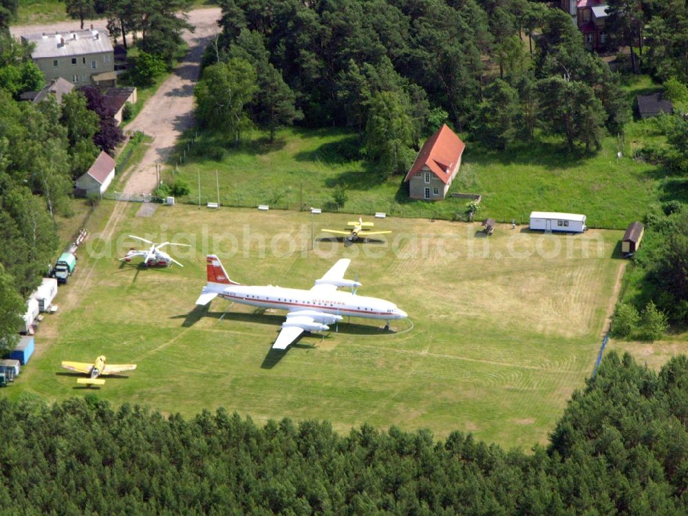 Aerial photograph Borkheide - IL-18 DDR-STE of GDR- airline INTERFLUG on exhibition grounds of the Hans Grade Museum with airplanes and helicopers at Postway in Borkheide in the state Brandenburg