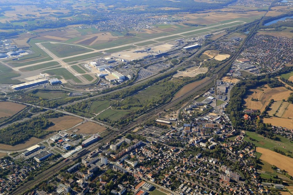 Aerial image Saint-Louis - Between Saint-Louis railway station and the terminal building of the airport Euroairport in Saint-Louis in Alsace-Champagne-Ardenne-Lorraine, France, a direct train connection is planned