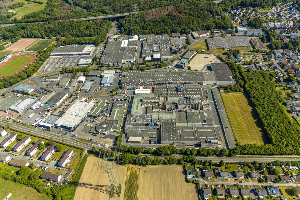 Arnsberg from the bird's eye view: Industrial and commercial area along the Arnsberger Strasse in Arnsberg in the state North Rhine-Westphalia, Germany