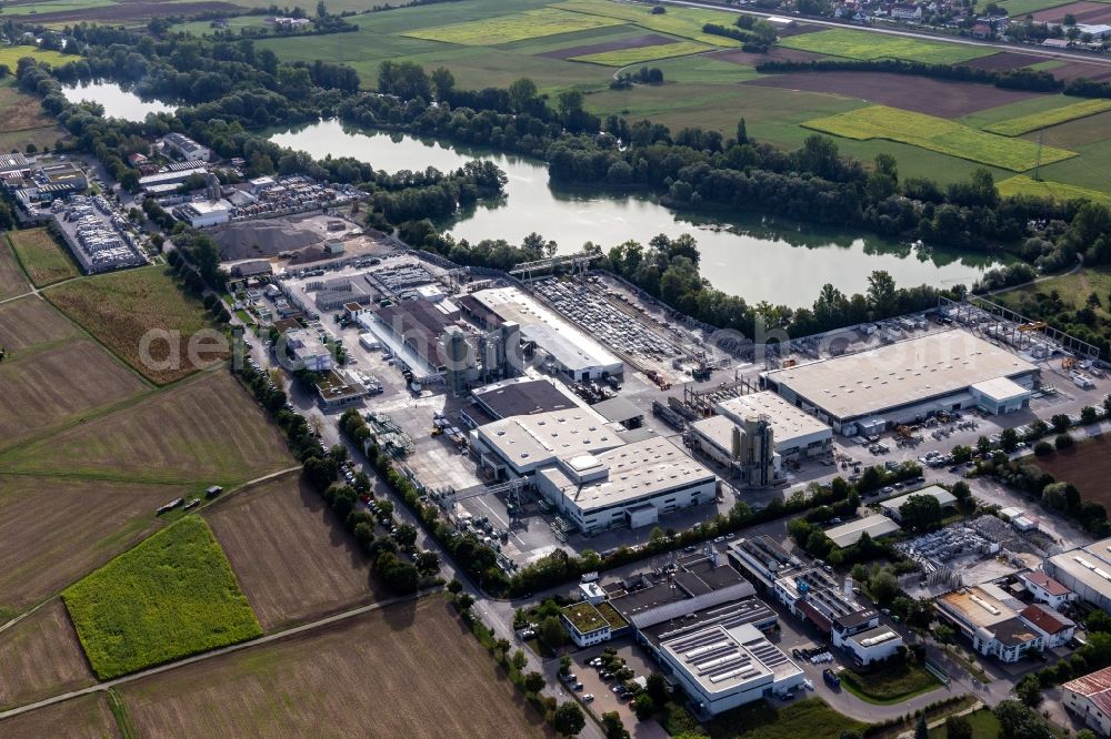 Aerial photograph Hirschau - Industrial and commercial area on Baggersee with Wabra GmbH, Aicheler & Braun GmbH, Betonwerk, Flonmer Bauunternehmung, Haendle Haerterei GmbH,Beton Kemmler GmbH, in Hirschau in the state Baden-Wuerttemberg, Germany