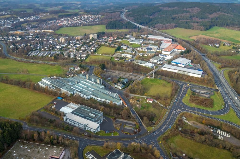 Aerial image Meinerzhagen - Industrial and commercial area overlooking the work premises and production buildings of the Danieli Germany GmbH and the gwk Gesellschaft Waerme Kaeltetechnik mbH at Scherl in Meinerzhagen in the state North Rhine-Westphalia, Germany