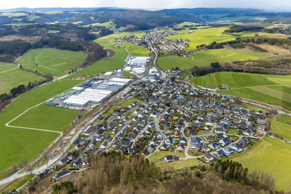 Aerial photograph Am Stöppelsweg - Industrial and commercial area along the Industriestrasse overlooking the residential areas in Am Stoeppelsweg in the state North Rhine-Westphalia, Germany