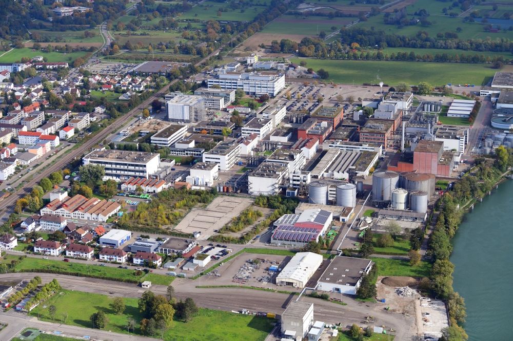 Grenzach-Wyhlen from the bird's eye view: Industrial and commercial area of the companies Roche and DSM Nutritional Products in Grenzach-Wyhlen in the state Baden-Wuerttemberg, Germany