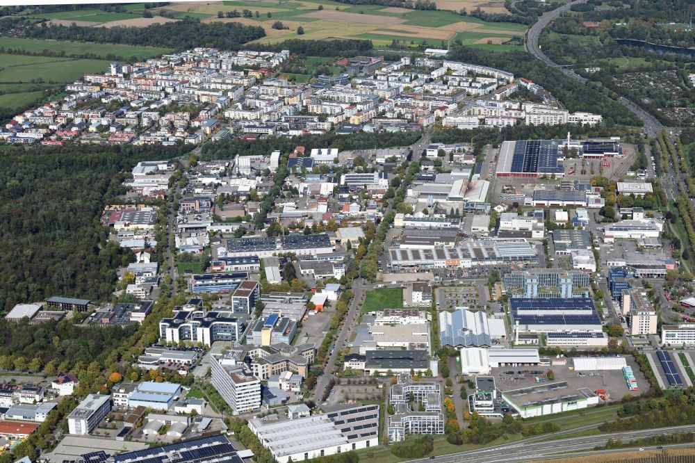 Aerial photograph Freiburg im Breisgau - Industrial and commercial area Haid and behind it district Rieselfeld in Freiburg im Breisgau in the state Baden-Wurttemberg, Germany