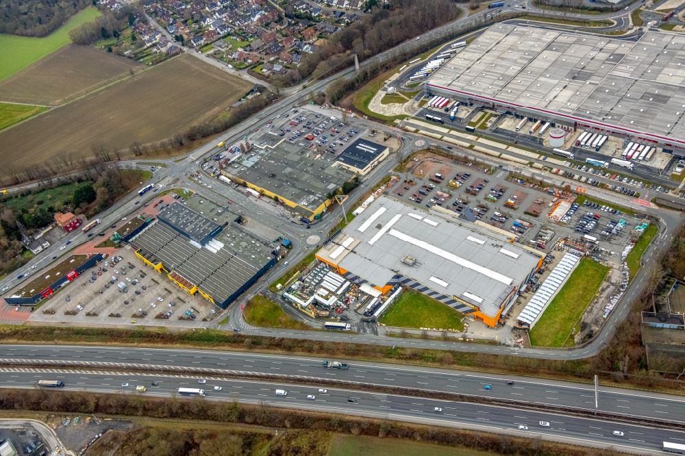 Kamen from the bird's eye view: Industrial and commercial area along the Unnaer Strasse in Kamen at Ruhrgebiet in the state North Rhine-Westphalia, Germany