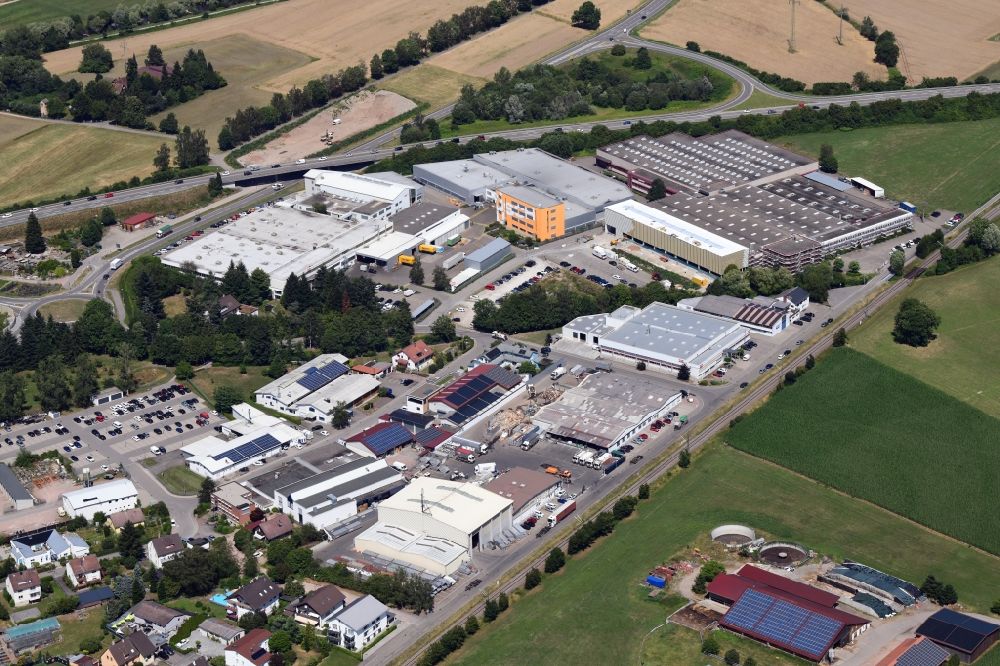 Aerial image Maulburg - Industrial and commercial area with Busch Vacuum Pumps and Systems, Luecke Metallveredelungs-GmbH and REMONDIS South in Maulburg in the state Baden-Wurttemberg, Germany