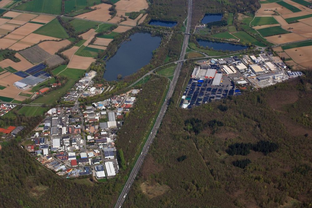 Aerial image Teningen - Industrial and commercial area Rohrlache and bathing lake in Teningen in the state Baden-Wuerttemberg, Germany