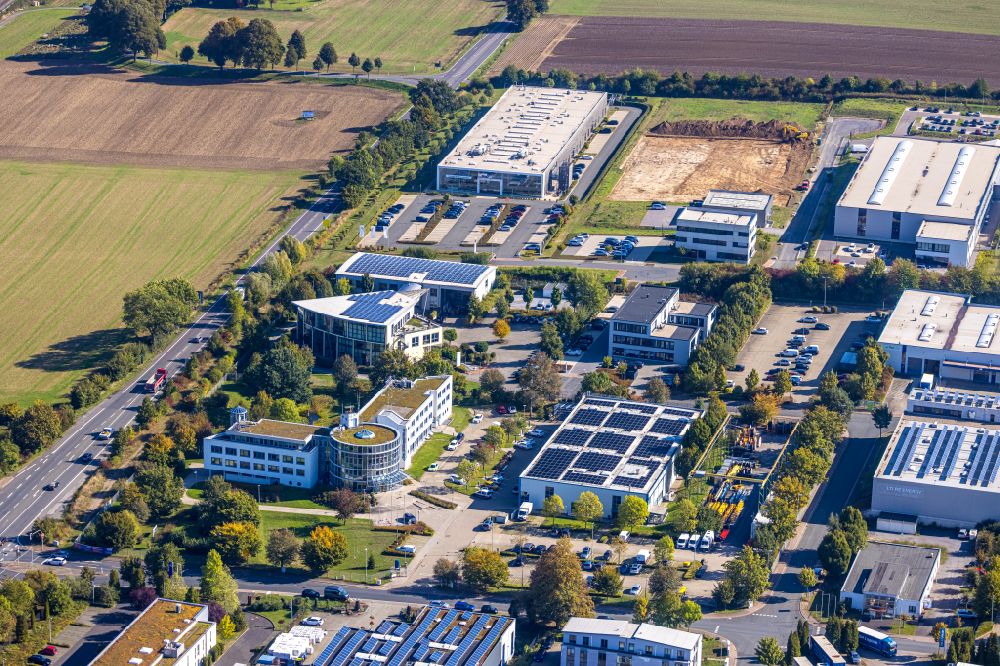 Unna from the bird's eye view: Industrial and commercial area on street Heinrich-Hertz-Strasse in the district Uelzen in Unna at Ruhrgebiet in the state North Rhine-Westphalia, Germany