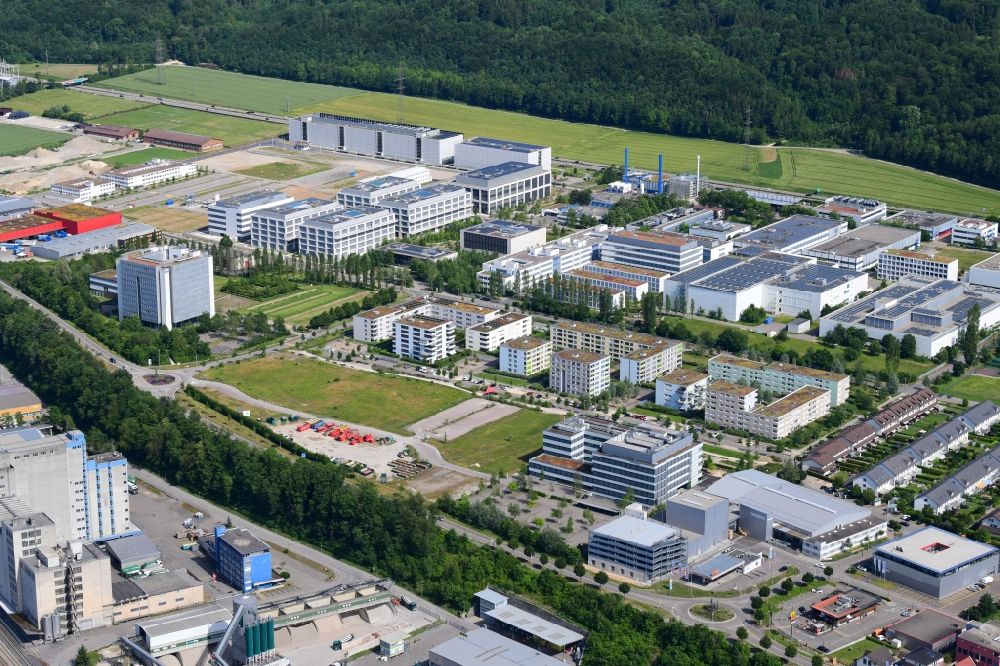 Kaiseraugst from the bird's eye view: Industrial and commercial area of DSM Nutritional Products and F. Hoffmann-La Roche in Kaiseraugst in the canton Aargau, Switzerland