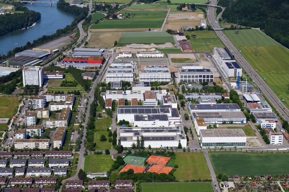 Kaiseraugst from above - Industrial and commercial area of DSM Nutritional Products and F. Hoffmann-La Roche in Kaiseraugst in the canton Aargau, Switzerland