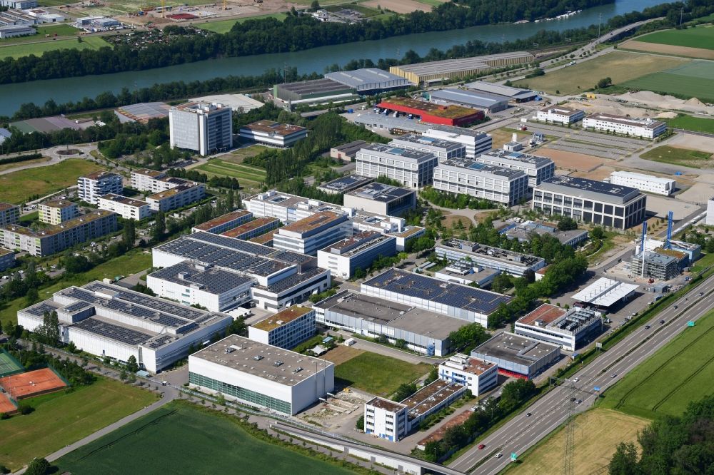 Aerial image Kaiseraugst - Industrial and commercial area of DSM Nutritional Products and F. Hoffmann-La Roche in Kaiseraugst in the canton Aargau, Switzerland