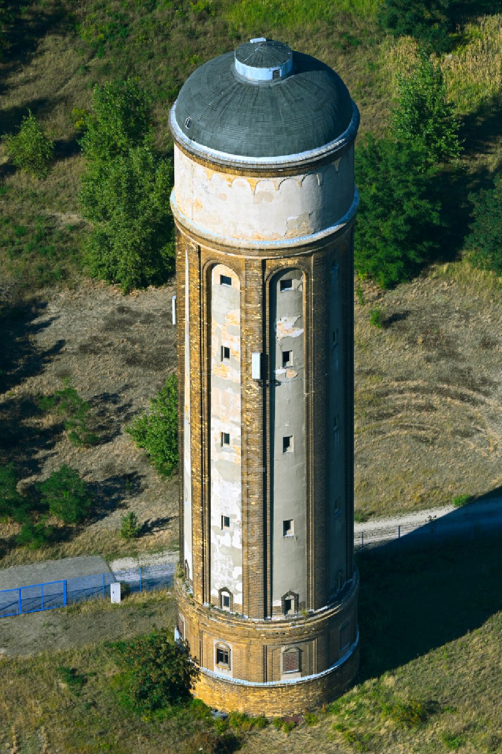 Aerial photograph Wolfen - Building of industrial monument water tower on street Helmholtzstrasse in Wolfen in the state Saxony-Anhalt, Germany