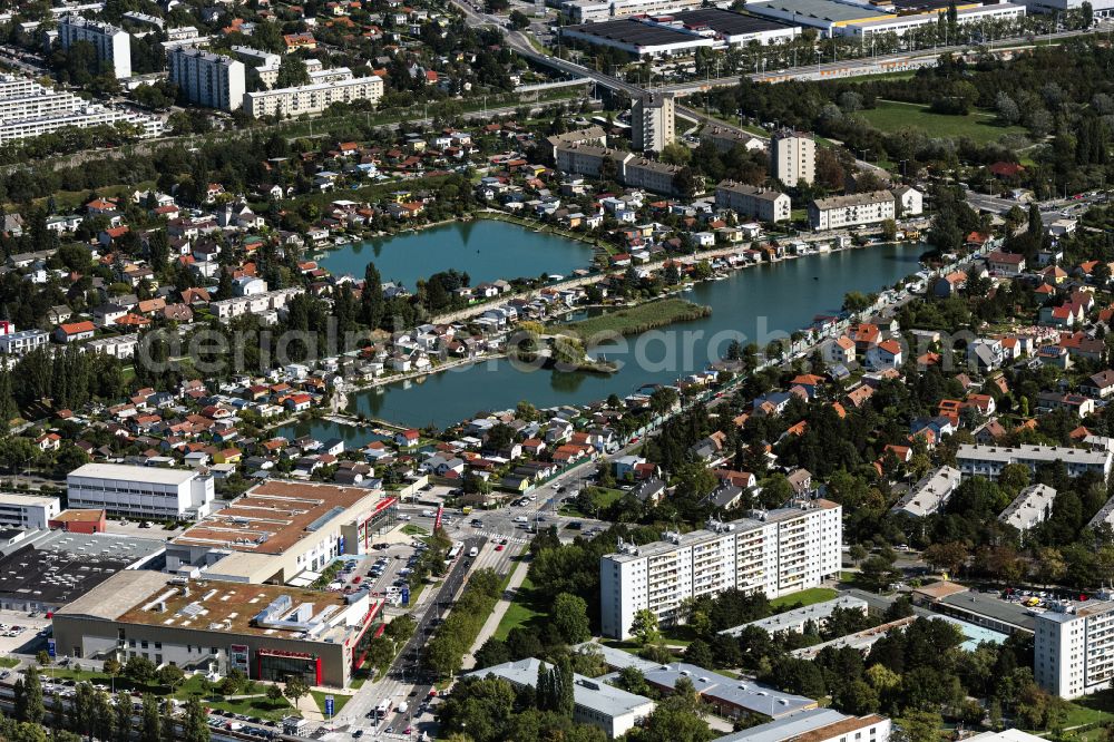 Wien from above - City view of the downtown area on the shore areas of Steinsee in Vienna in Austria