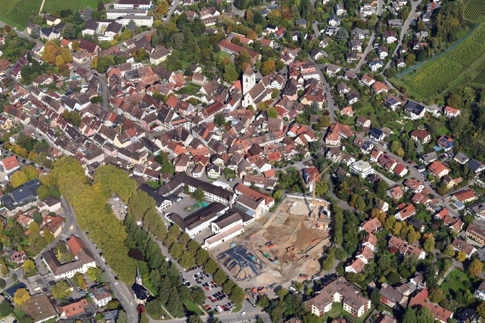 Aerial photograph Staufen im Breisgau - City center and with old town and construction works at the Schladerer area in Staufen im Breisgau in the state Baden-Wurttemberg, Germany