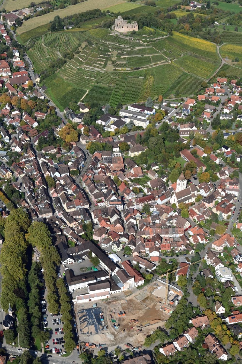 Staufen im Breisgau from above - City center and with old town and construction works at the Schladerer area in Staufen im Breisgau in the state Baden-Wurttemberg, Germany