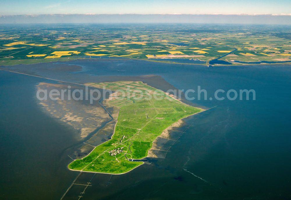 Aerial photograph Oland - Oland is a small hallig which is connected by a narrow gauge railway to the mainland and to hallig Langeneß. Germany's smallest lighthouse is located here, being also the only one with a thatched roof