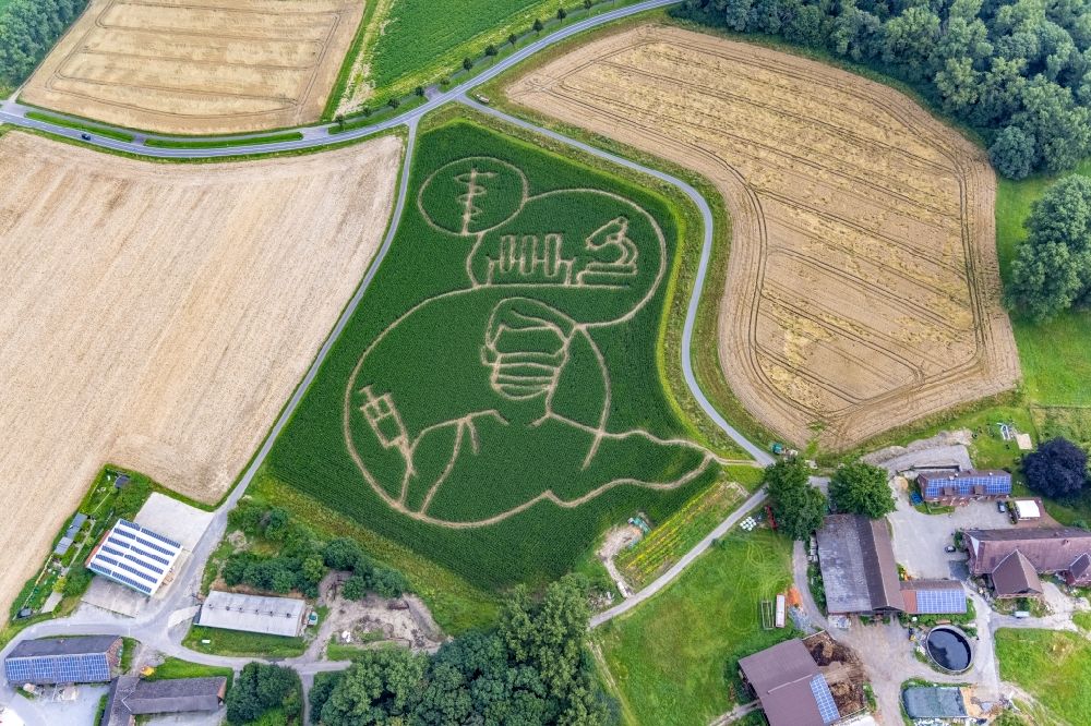 Selm from the bird's eye view: Maze - Labyrinth with the outline of Get vaccinated in a field in Selm in the state North Rhine-Westphalia, Germany