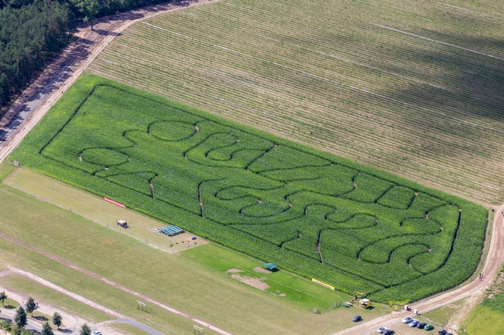 Aerial image Klaistow - Maze - Labyrinth with the outline of on Spargel- and Erlebnishof Klaistow on Glindower Strasse in a field in Klaistow in the state Brandenburg, Germany