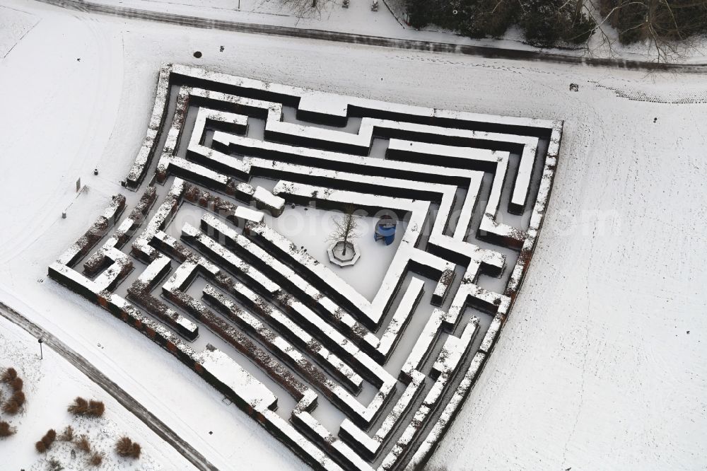 Berlin from above - Maze - Labyrinth on the wintry snowy terrain of the Marzahn Recreational Park in the district Marzahn in Berlin