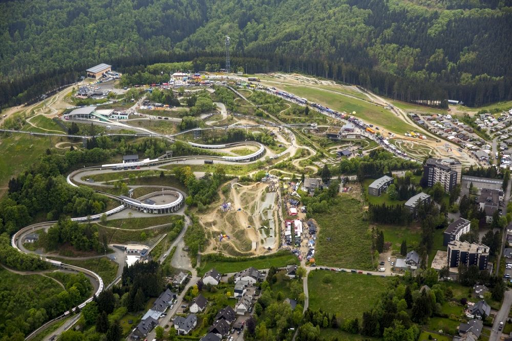 Winterberg from the bird's eye view: IXS Dirt Masters Mountainbike Freeride Festival at the Bike Park in Winterberg in the state North Rhine-Westphalia