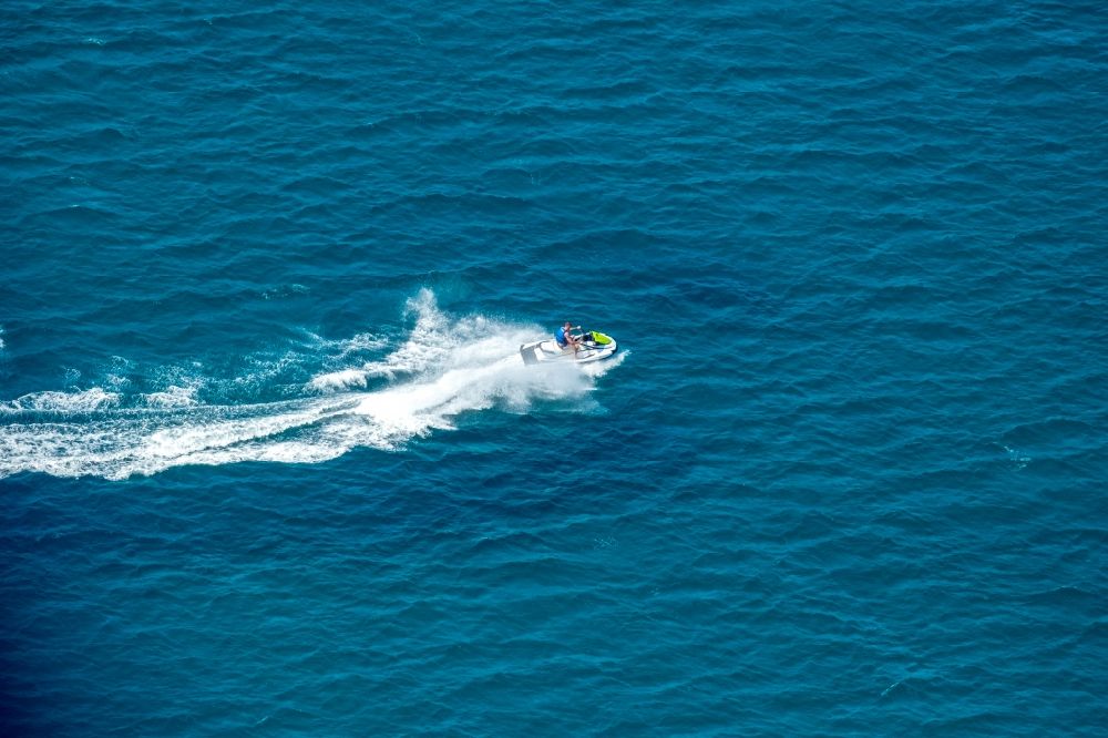 Palma from above - Jetski Sport boat - rowing boat ride in the bay of Palma in Palma in Balearic island of Mallorca, Spain