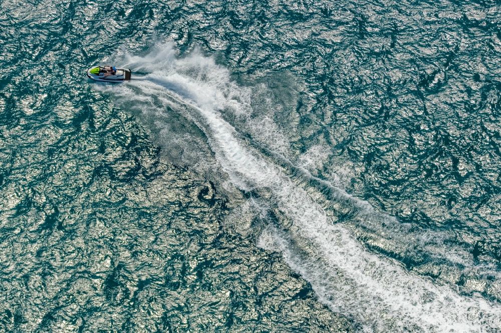 Palma from the bird's eye view: Jetski Sport boat - rowing boat ride in the bay of Palma in Palma in Balearic island of Mallorca, Spain