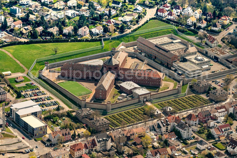 Bruchsal from above - Prison grounds and high security fence Prison on street Schoenbornstrasse in the district Untergrombach in Bruchsal in the state Baden-Wuerttemberg, Germany