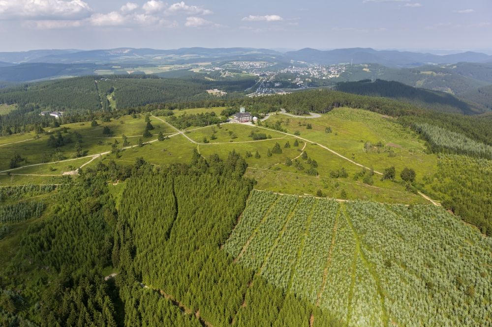 Winterberg from above - View at the monument protected mountain inn Kahler Asten and the Astenturm near Winterberg the federal state of North-Westphalia Rhine. In the Astenturm located are a weather station and a permanent exhibition about nature conservation