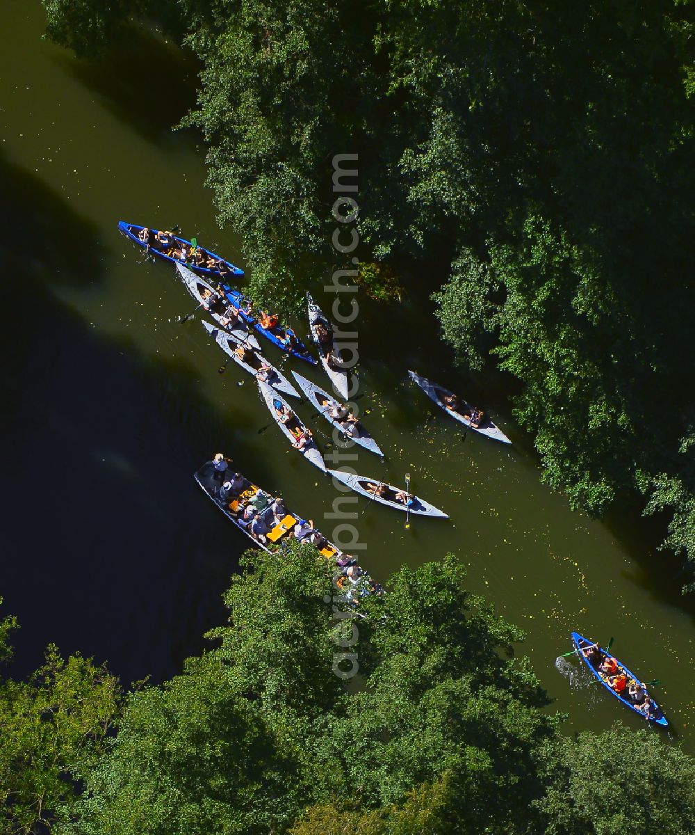 Lübbenau/Spreewald from above - Kayak - canoe - sports boats and a Spreewald barge in motion on a river in Leipe in the Spreewald in the state Brandenburg, Germany