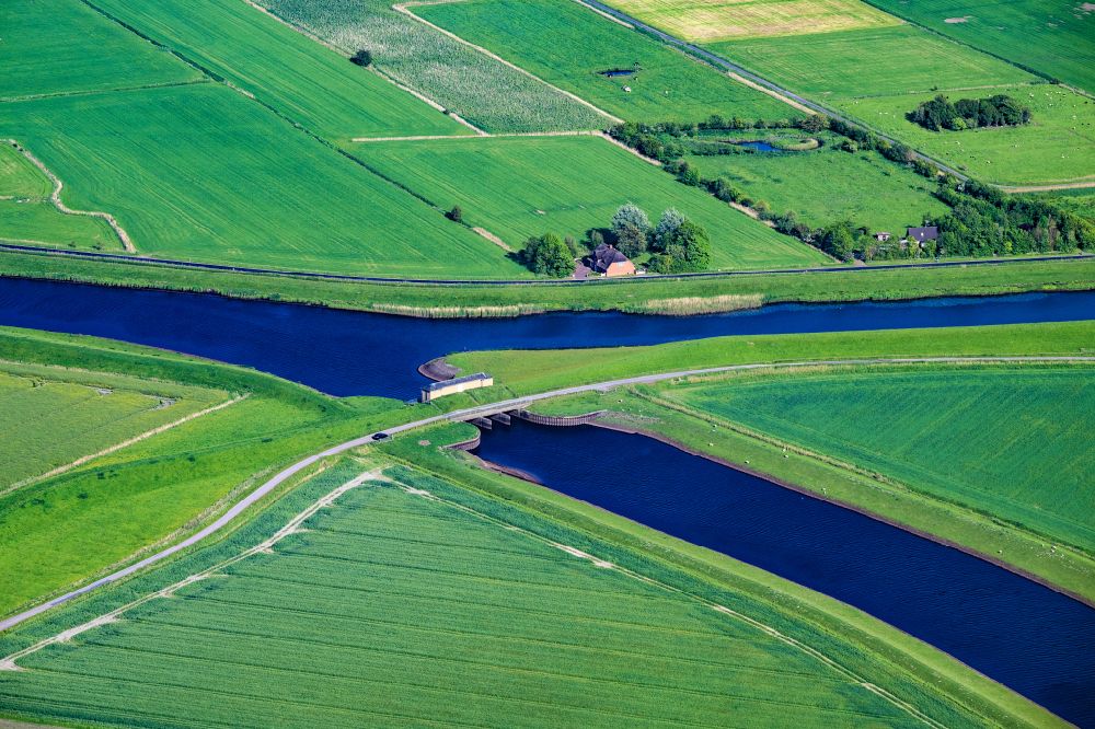 Aerial photograph Ockholm - Canal course and shore areas of the connecting canal Bongsieler Kanal in Ockholm North Friesland in the state Schleswig-Holstein, Germany
