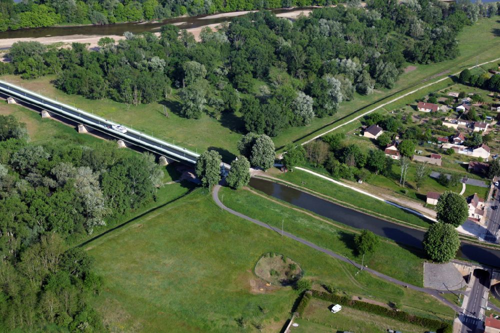 Aerial image Briare - Canal course and shore areas of the connecting canal Briare canal bridge in Briare in Centre-Val de Loire, France. With this bridge the canal crosses the river Loire