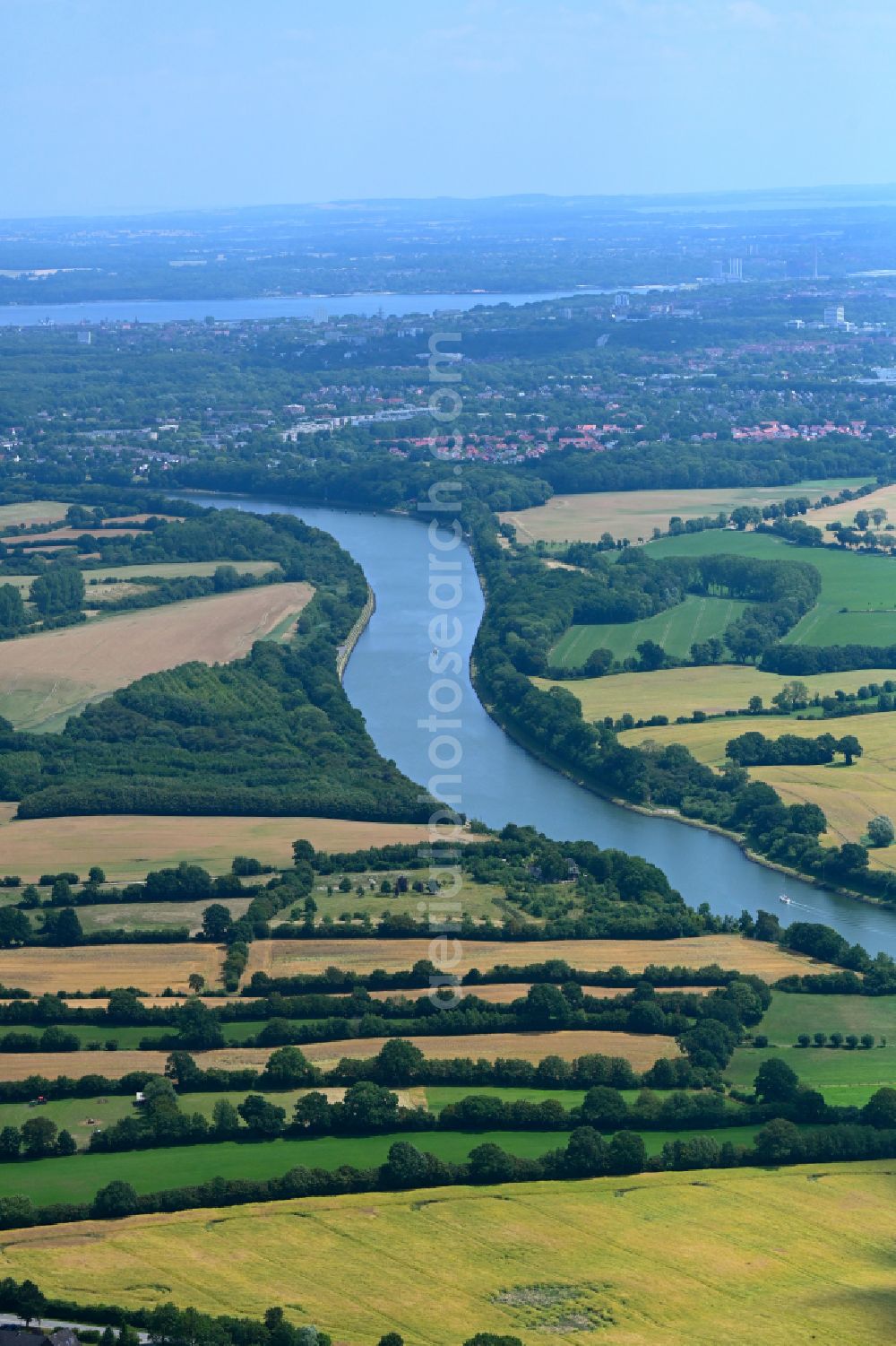 Neuwittenbek from above - Course of the canal and shore areas of the waterway of the inland navigation Kiel Canal in Neuwittenbek in the state Schleswig-Holstein, Germany