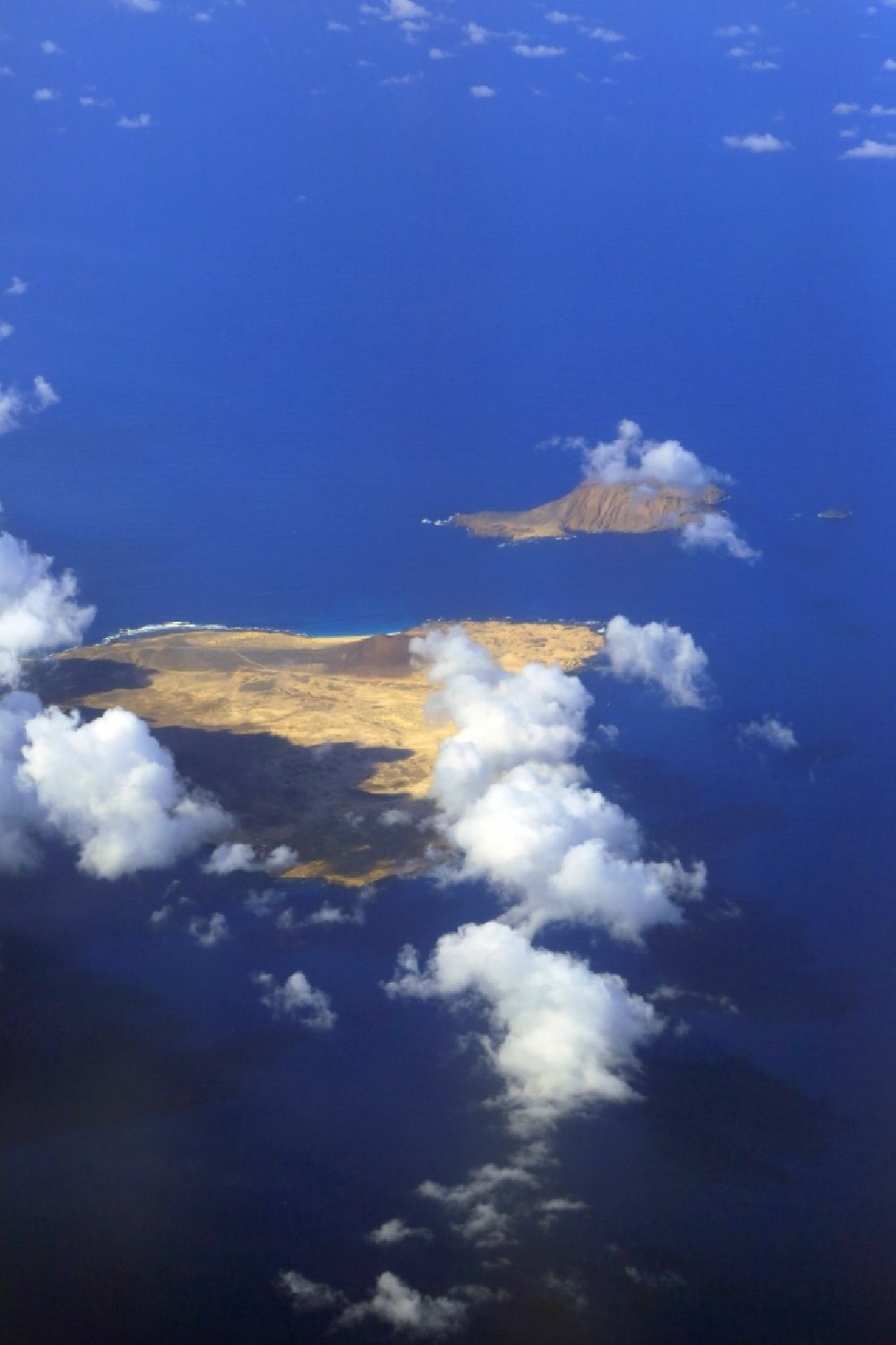 Caleta del Sebo from the bird's eye view: Coastal area of the Canary Islands La Graciosa and Isla de Montana Clara, Canaries, Spain