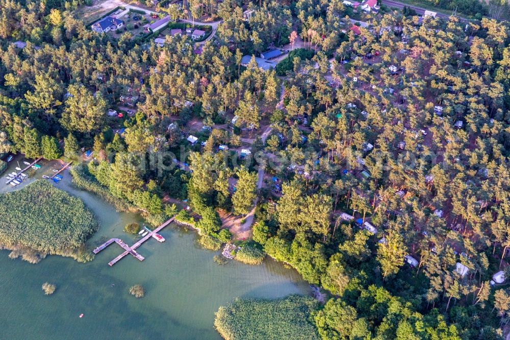 Aerial photograph Oberuckersee - Canoo berths and moorings on the shore area of Conping on Oberuckersee in the district Warnitz in Oberuckersee in the state Brandenburg, Germany