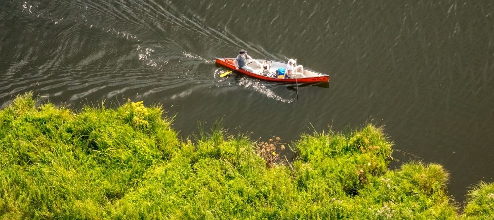 Aerial image Schönfeld - Canoe ride on the river Peene with bank in Schoenfeld in the state Mecklenburg - Western Pomerania