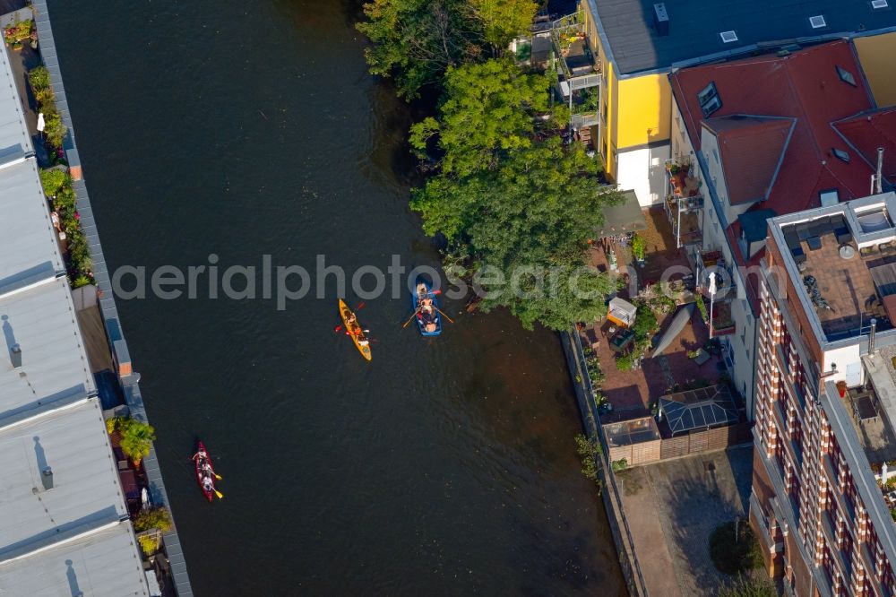 Aerial image Leipzig - Canoeists and rowing boat in motion along the course of the Weisse Elster river in the district Schleussig in Leipzig in the state Saxony, Germany