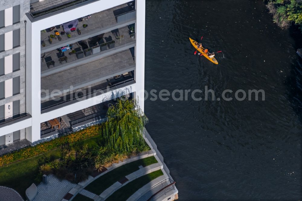 Leipzig from above - Canoeists and rowing boat in motion along the course of the Weisse Elster river in the district Schleussig in Leipzig in the state Saxony, Germany