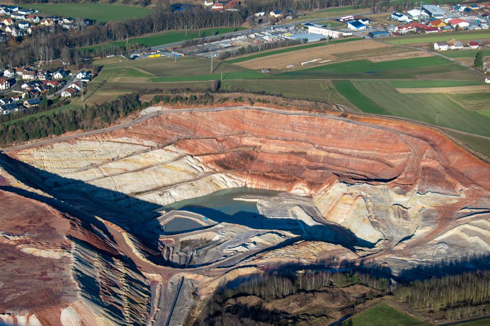 Hirschau from the bird's eye view: Site and tailings area of the gravel mining on street B14 in Schnaittenbach / Hirschau in the state Bavaria, Germany