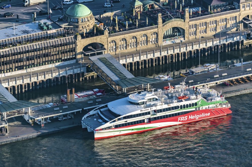 Aerial image Hamburg - Passenger ship (catamaran) of the shipping company FRS Helgoline GmbH & Co. KG at the Landungsbruecken in Hamburg, Germany