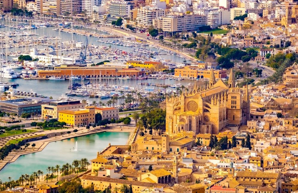 Aerial photograph Palma - Church building of the cathedral on Placa de la Seu in the old town - center with a view of the harbor in Palma de Mallorca on the Balearic island of Mallorca, Spain