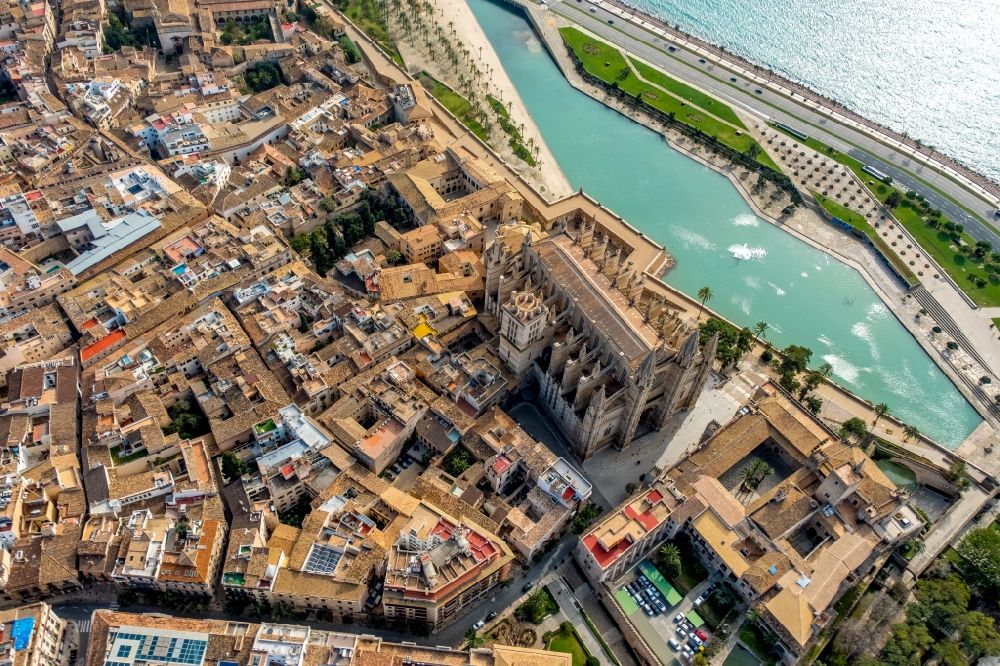 Palma from above - Church building of the cathedral on Placa de la Seu in the old town - center with lake and fountain in Parc de la Mar in Palma de Mallorca on the Balearic island of Mallorca, Spain