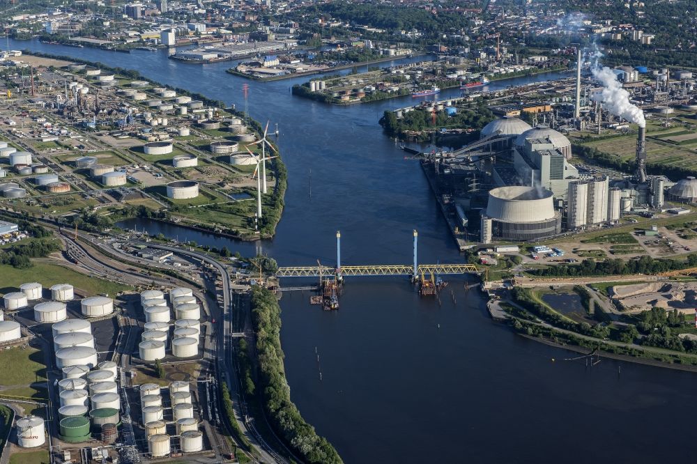 Aerial photograph Hamburg - Bridge Kattwykbruecke across the Sued- Elbe in Hamburg, Germany. The bridge is located in the port of Hamburg and is being used for rail and road traffic. Kattwykdamm crosses the bridge with its blue tower