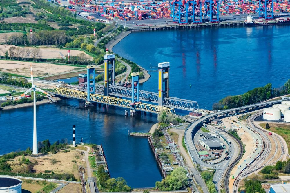 Aerial image Hamburg - Bridge Kattwykbruecke across the Sued- Elbe in Hamburg, Germany. The bridge is located in the port of Hamburg and is being used for rail and road traffic. Kattwykdamm crosses the bridge with its blue tower