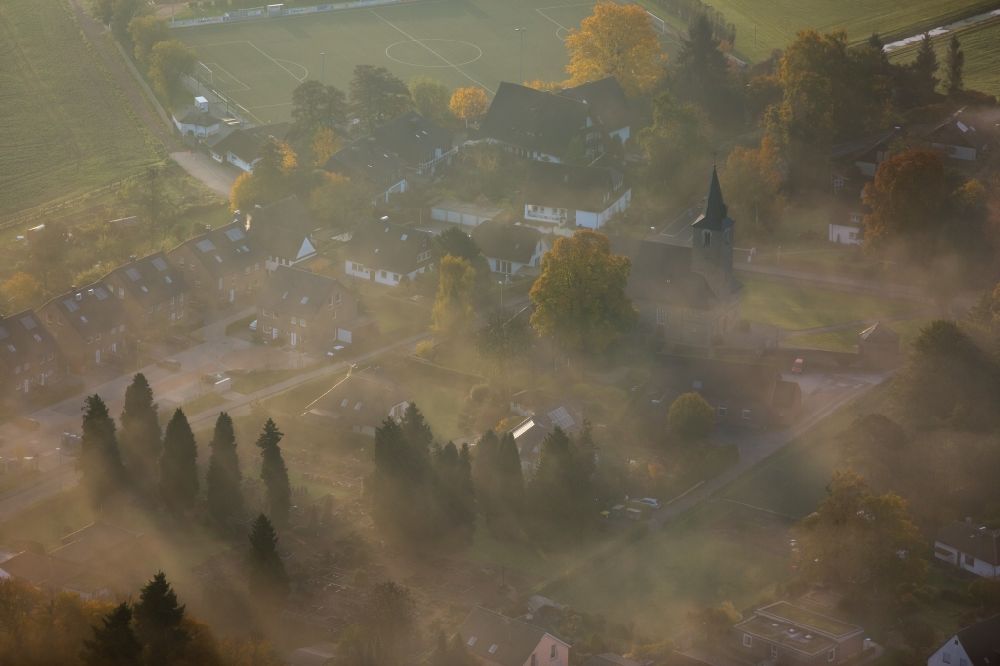Aerial photograph Kettwig - Kettwig in the valley of the river Ruhr after sunrise in fog in the state of North Rhine-Westphalia
